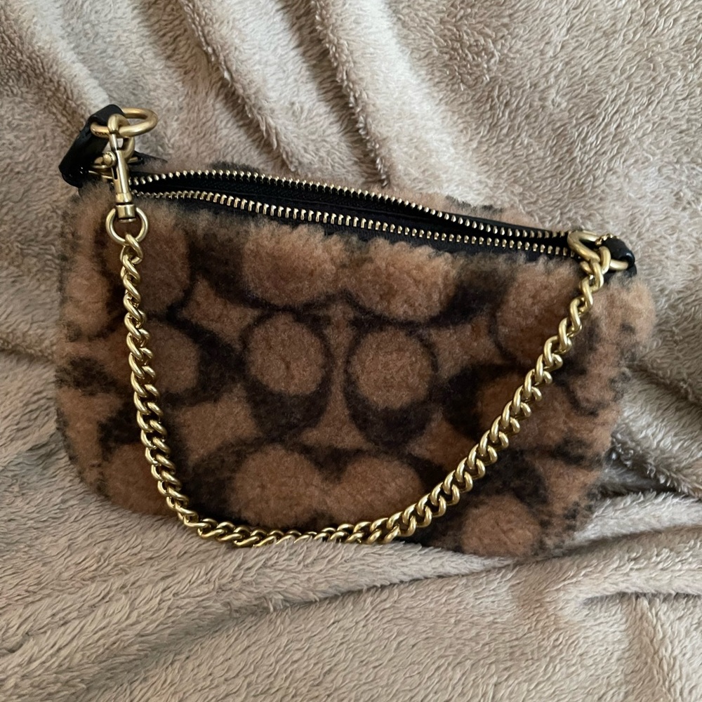 Coach x JLO Nolita 19 in signature shearling